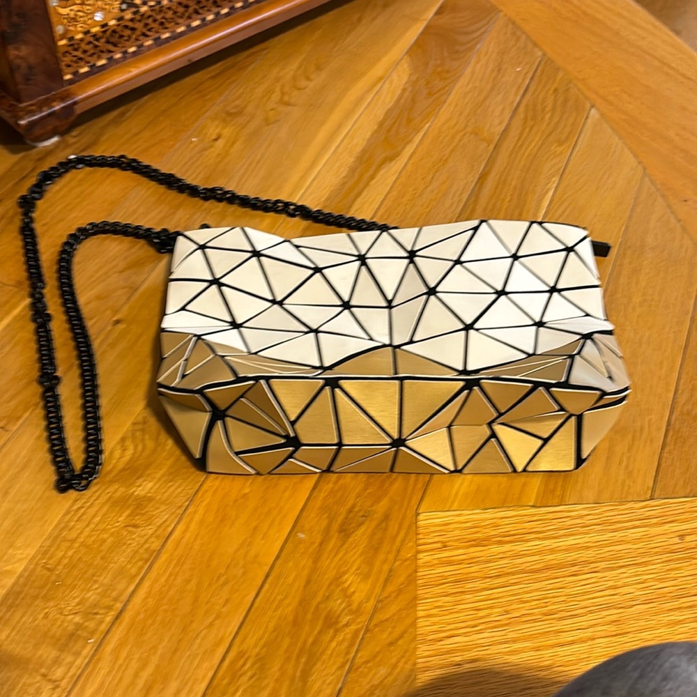 Patricia Luca puzzle bag, can be a clutch, shoulder or wristlet bag.